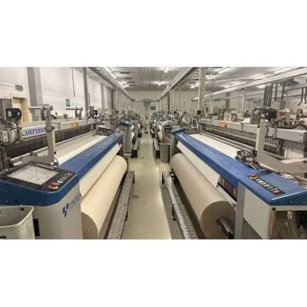 Airjet looms weaving fabric on the production floor